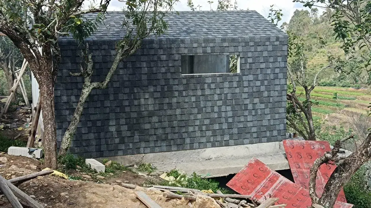 Architectural shingle wall cladding on a modern structure